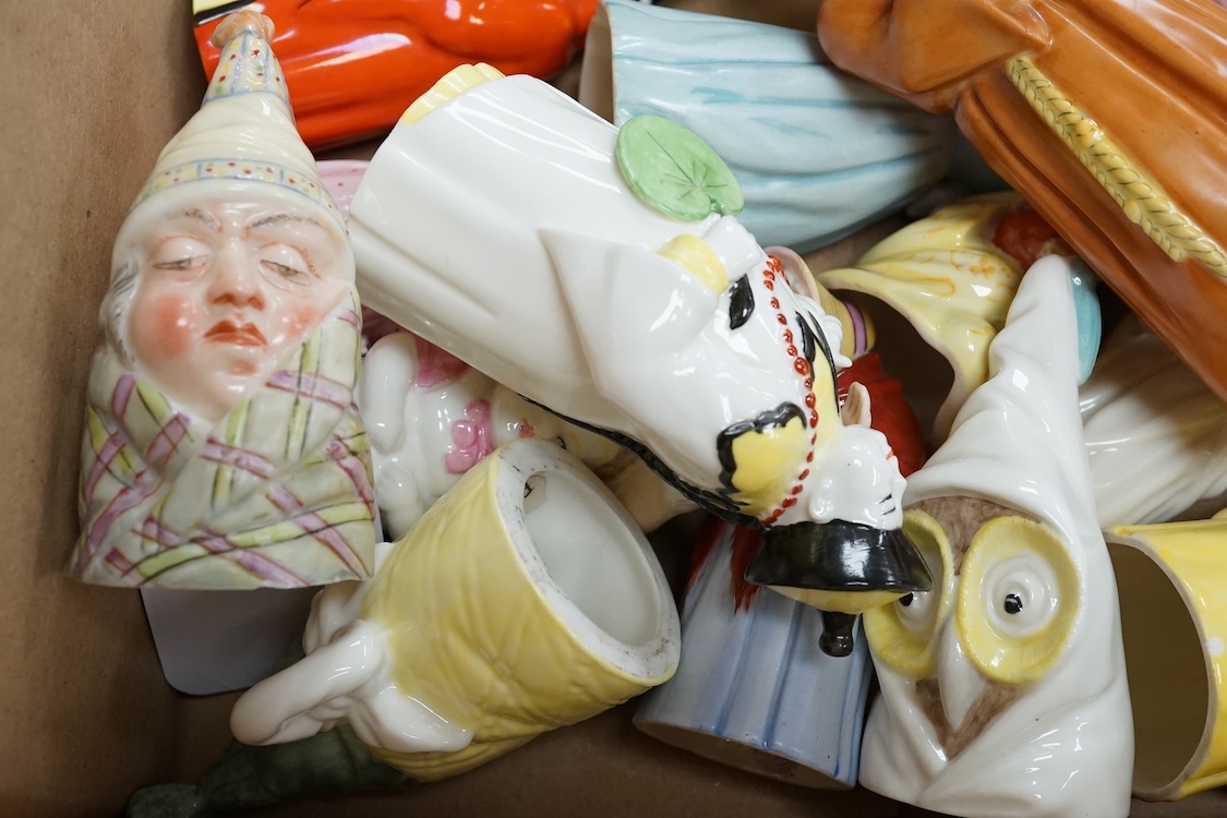 A collection of porcelain extinguishers to include Royal Worcester owl, Jenny Lind and Mandarin, largest 12cm high